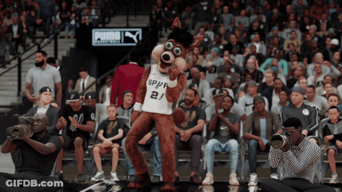 Mascot In Spurs Jersey Dancing In Crowd GIF