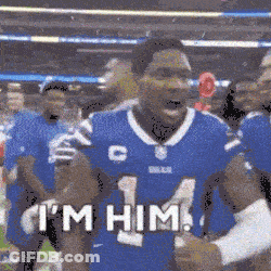 Mascot In Spurs Jersey In Crowd GIF