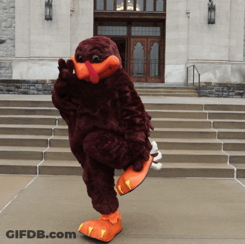 Mascot In Turkey Costume Standing On One Leg GIF