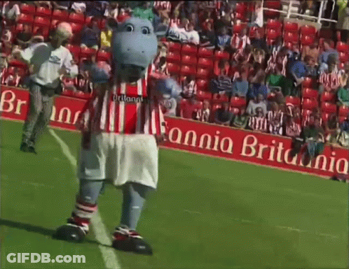 Mascot On Soccer Field Wearing Britain Jersey GIF