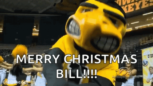 Mascot Saying Merry Christmas Bill With Cheerleaders GIF