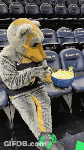 Mascot Sitting In Empty Lexus Seat Holding Popcorn GIF