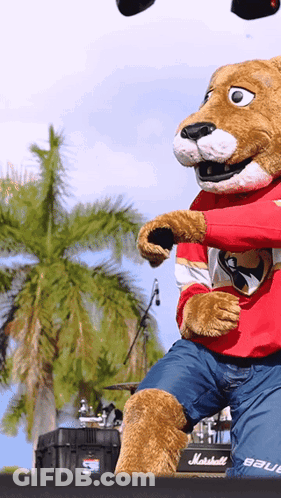 Mascot Standing In Front Of Marshall Amp GIF