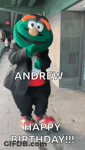 Mascot Standing On Sidewalk Saying Happy Birthday GIF