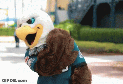 Mascot Wearing Blue Eagle Shirt GIF