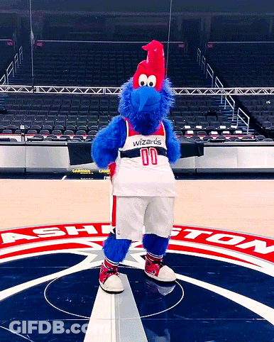 Mascot Wearing Wizards Jersey On Basketball Court GIF
