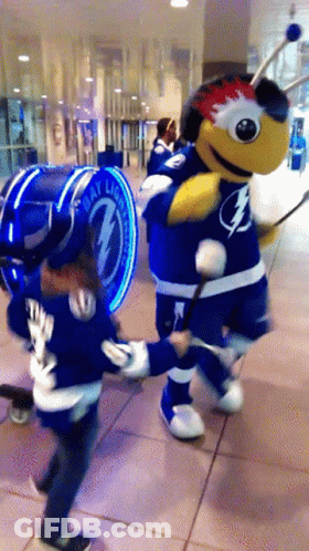Mascot With Lightning Bolt Shirt Next To Bay Lightning Sign GIF