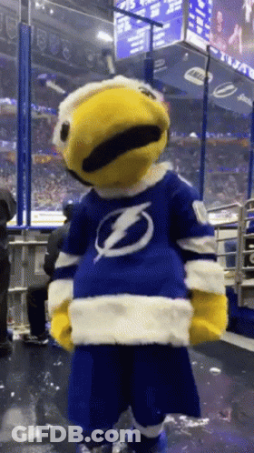 Mascot With Lightning Bolt Shirt On Ice GIF