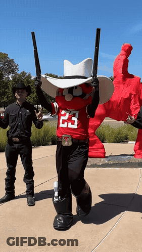 Mascot With Number 23 Holding Two Guns GIF
