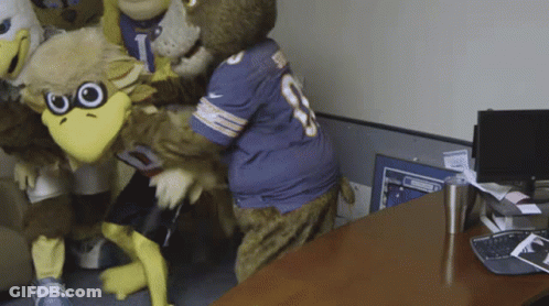 Mascots One Wearing Number 8 Jersey GIF