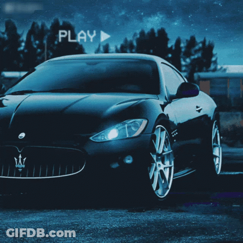 Maserati Parked In Front Of Play Sign GIF