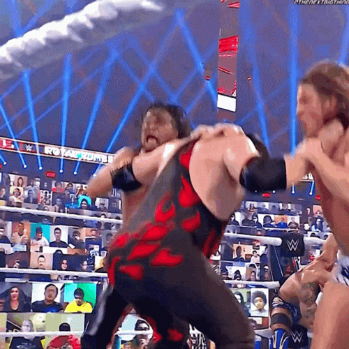 Masked Kane Chokeslam Riddle And Shinsuke Nakamura GIF