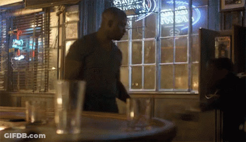 Masked Man And Green Superhero GIF