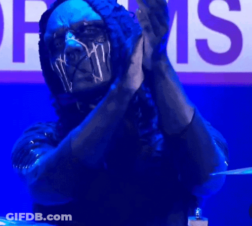 Masked Man Clapping Drums Sign GIF