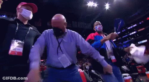 Masked Man Dancing In Stadium GIF