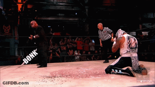 Masked Man Holding Lighter @Luchaelrey GIF