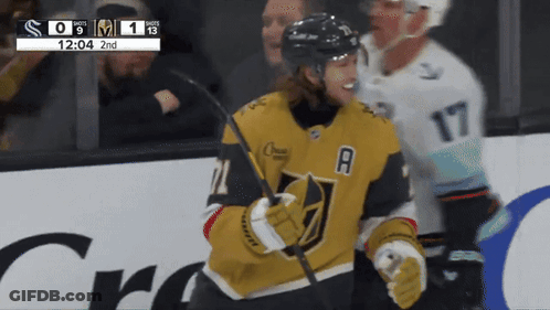 Masked Man Holding Microphone On Stage GIF