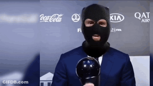 Masked Man Holding Trophy Coca-Cola Kia Qatar Air GIF
