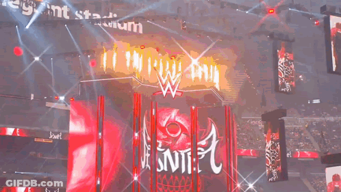 Masked Man Walking Red Aisle With Jennifer Sign GIF