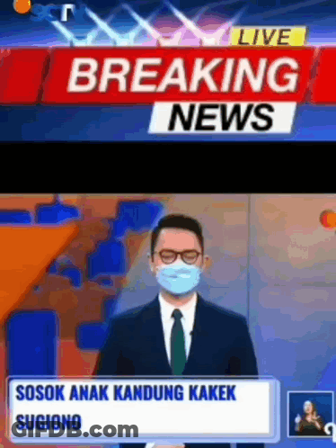 Masked Man With Glasses On Breaking News GIF