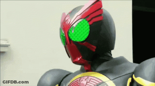 Masked Rider Helmet With Green Eyes GIF