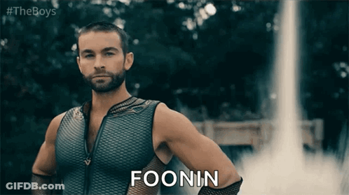 Masked Superhero Sitting At Computer GIF