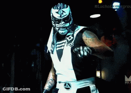Masked Wrestler With Microphone Saying Raw GIF
