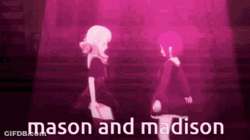 Mason And Madison Are Standing Next To Each Other On A Stage In A Dark Room . GIF