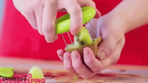 Mason Jar Pouring Fruit Into Glass Country Living GIF