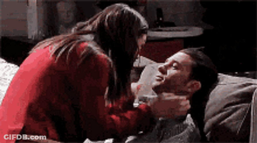 Massimo Cradled Laura Couch Kiss 365 Dyas GIF