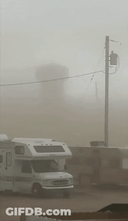 Massive Dust Storm Covering Skyscrapers GIF