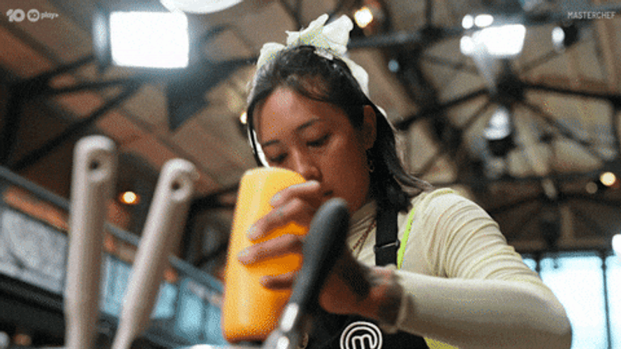 Master Chef Contestant Swirl Her Hand GIF