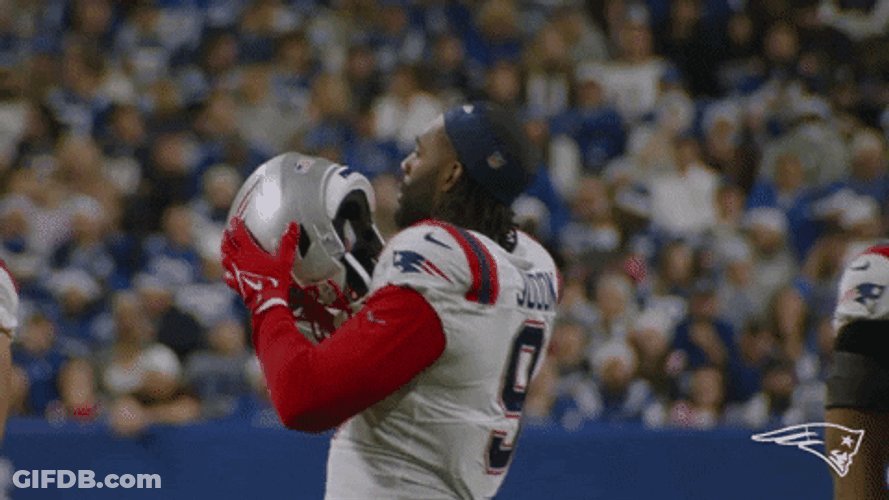 Matthew Judon Putting Helmet GIF