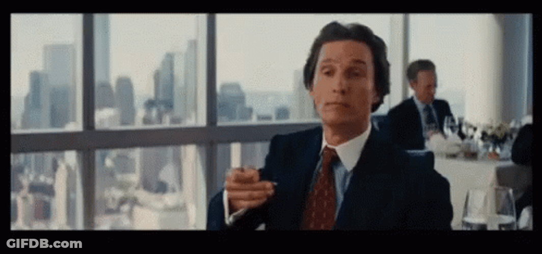 Matthew Mcconaughey Stretching Arm Wolf Of Wall Street GIF