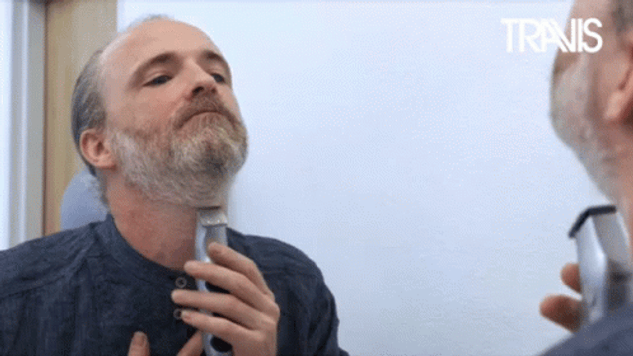Matured Man Does Shaving In Front Of Mirror GIF