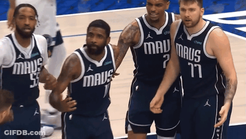 Mavericks Basketball Players Standing On Court GIF