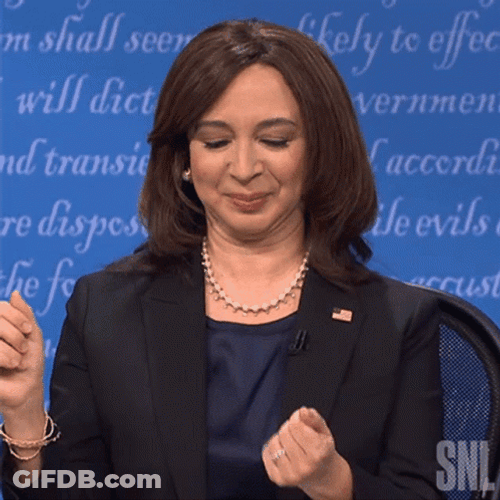 Maya Rudolph Patting Her Face GIF