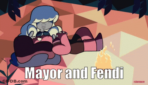 Mayor And Fendi Laying By A Fire GIF