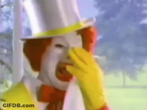 Mcdonald 'S Clown Covering His Nose With His Hand GIF