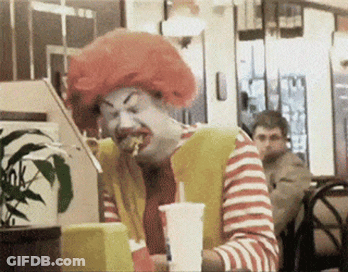 McDonald's Clown Eating Hamburger GIF