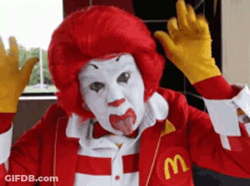 McDonald's Clown Sticking Out Tongue In McDonald's Jacket GIF