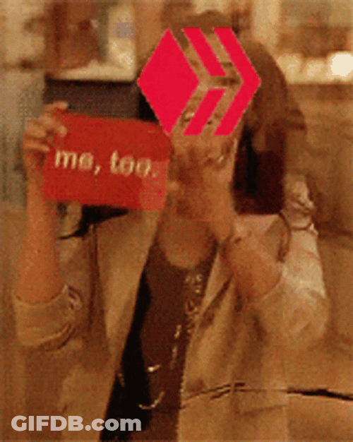 Me Too Sign Behind Glass GIF