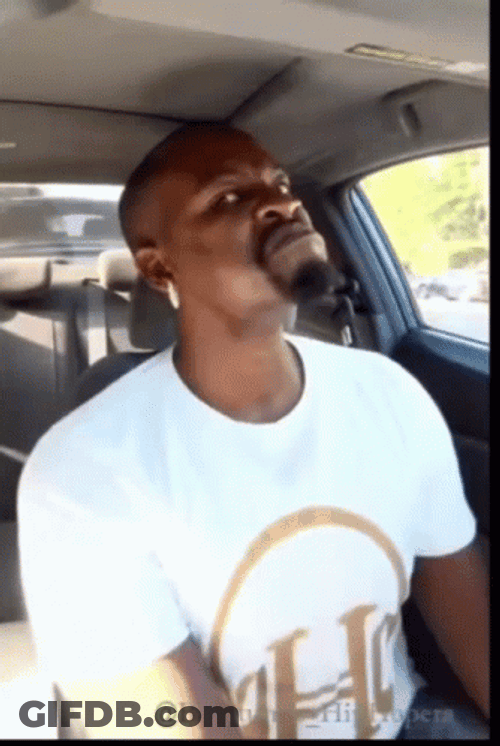 Mean Mug Of Man Inside Car GIF