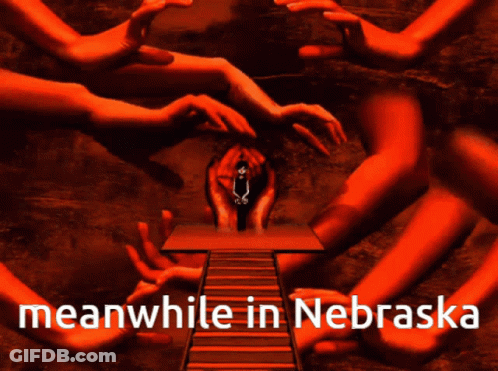 Meanwhile In Nebraska Poster Red Background GIF