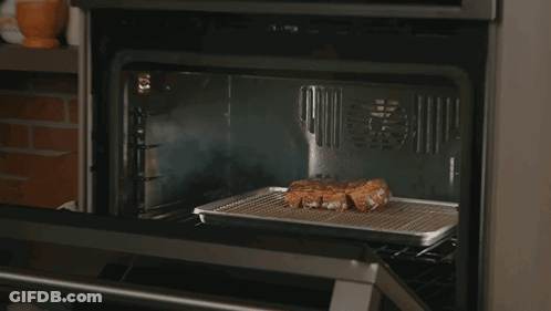 Meat Cooking On Rack In Oven GIF