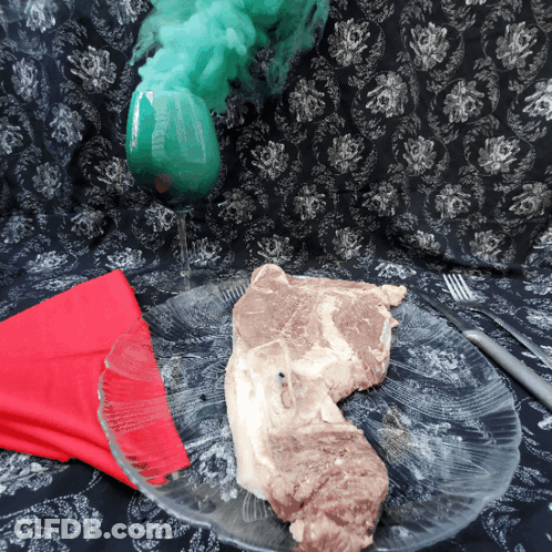 Meat On Plate Next To Green Drink GIF