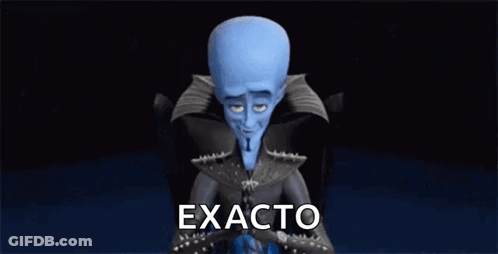 Megamind Cartoon Character Sitting With Folded Hands GIF