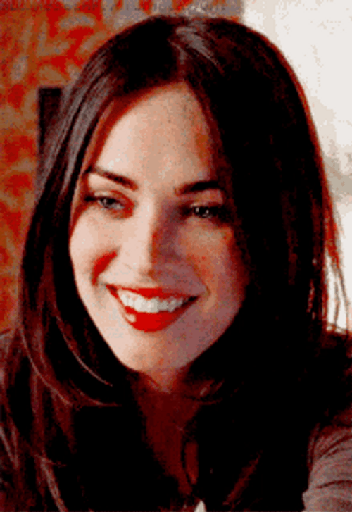 Megan Fox Looking Down And Smiling GIF