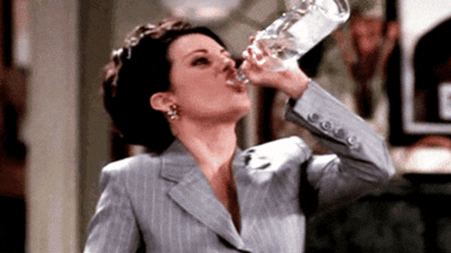 Megan Mullally On Two Shots Of Vodka GIF