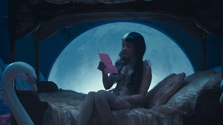 Melanie Martinez Lying In Bed GIF